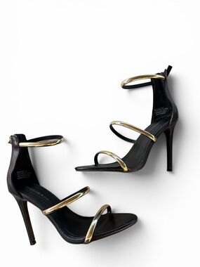 bebe Black and Gold Strappy High Heel Sandals